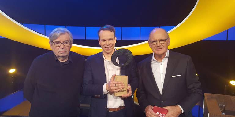 Peter Hein met trofee tussen Maarten van rossum en Philip Freriks