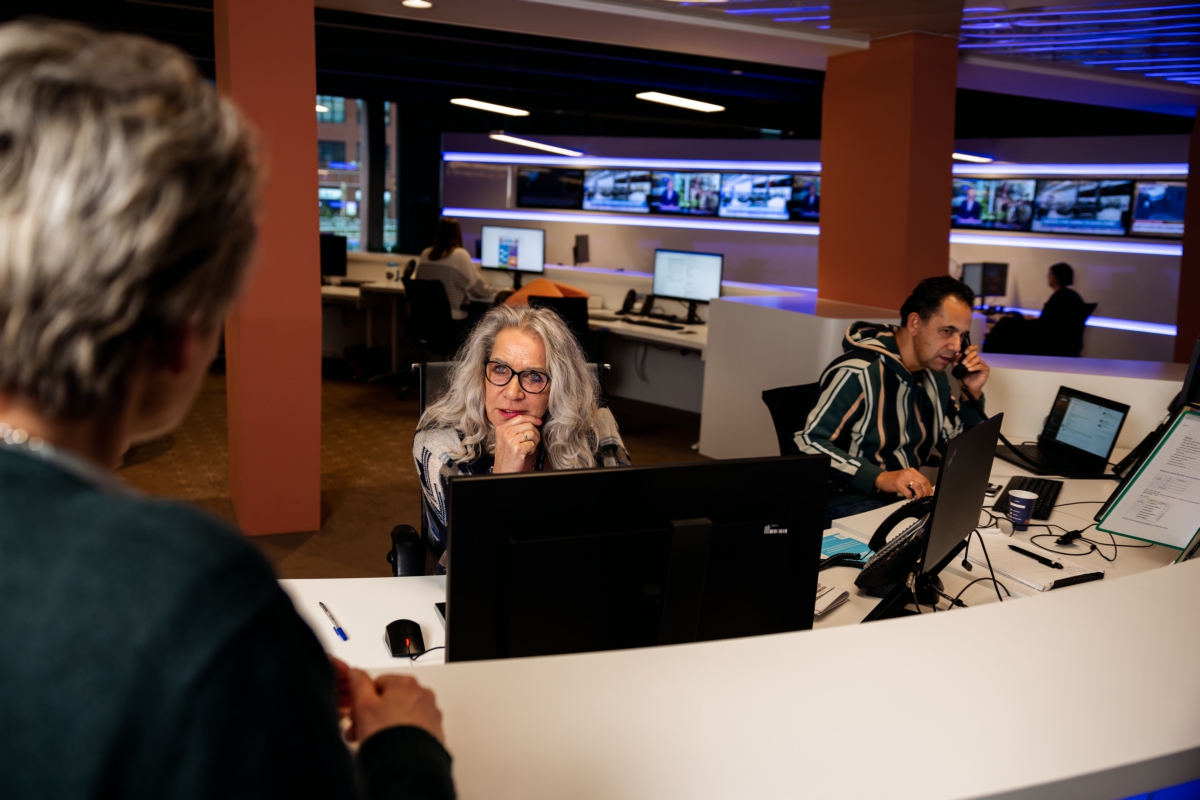 Employees working behind the computer